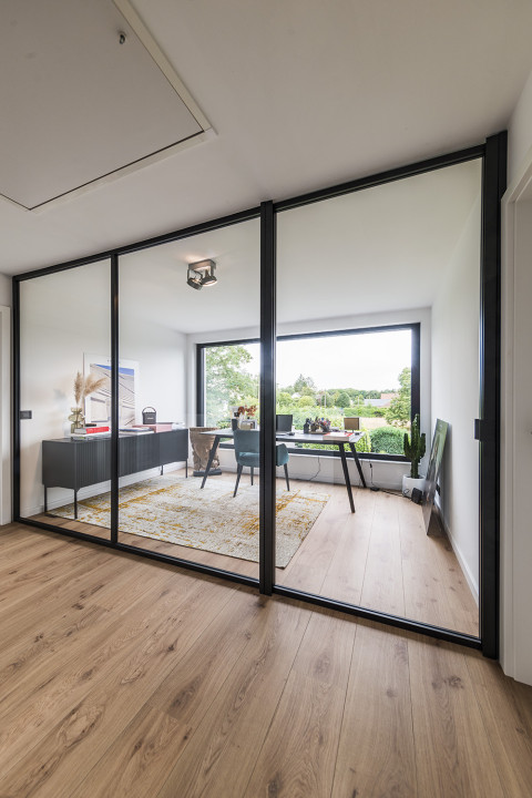 Separation between office and hall without loss of light and openness thanks to ARLU&#039;s divina - a glass divider with glass swing door