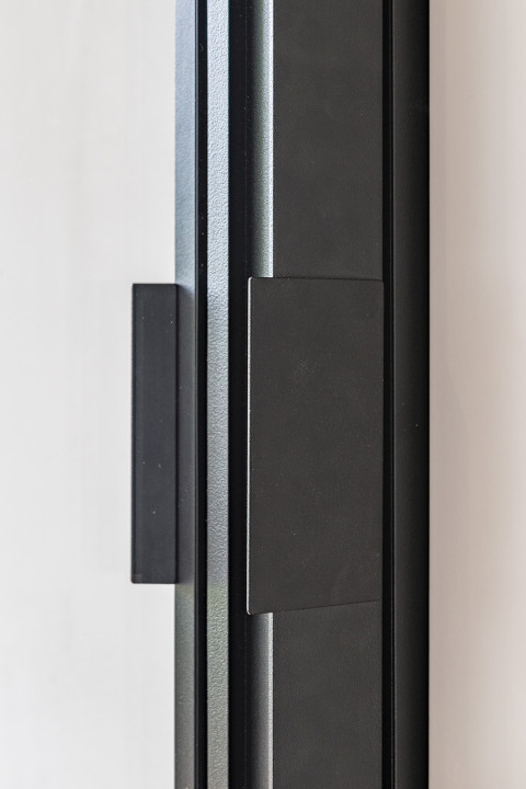 Separation between office and hall without loss of light and openness thanks to ARLU's divina - a glass divider with glass swing door